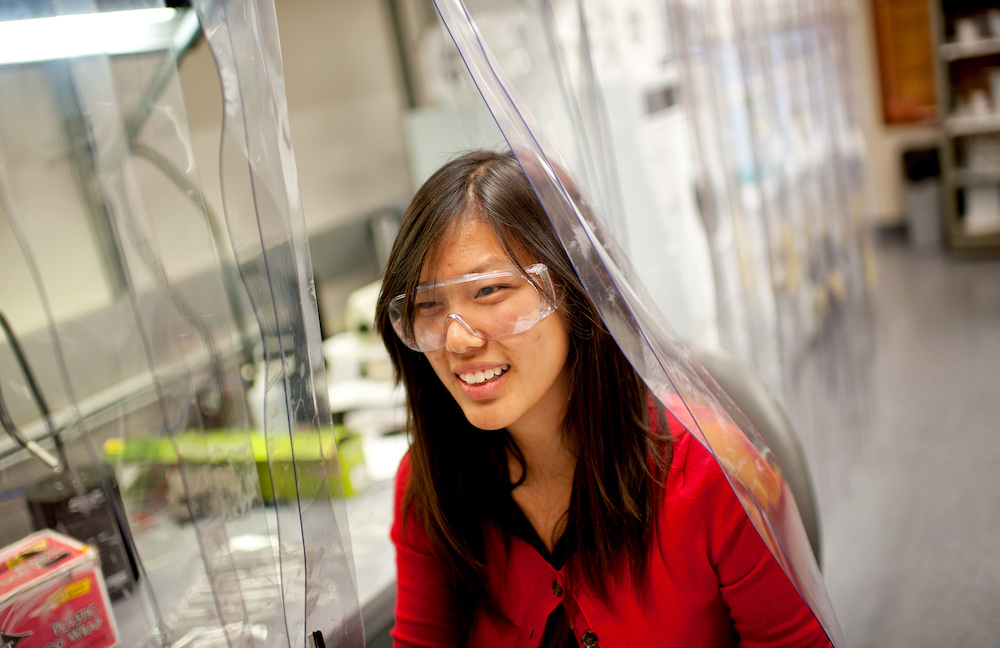 Student wearing goggles in lab.